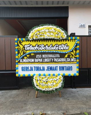 Papan Bunga Duka di Hadimulyo Barat